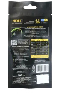 Getrocknete schwarze snEco-Oliven „Knusprig“, 14 g — Rückseite der Packung Getrocknete schwarze snEco-Oliven „Knusprig“, 14 g